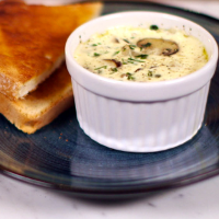 Coddled eggs with mushrooms and lovage
