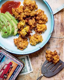 Cod's roe and sweetcorn fritters with avocado and Sriracha