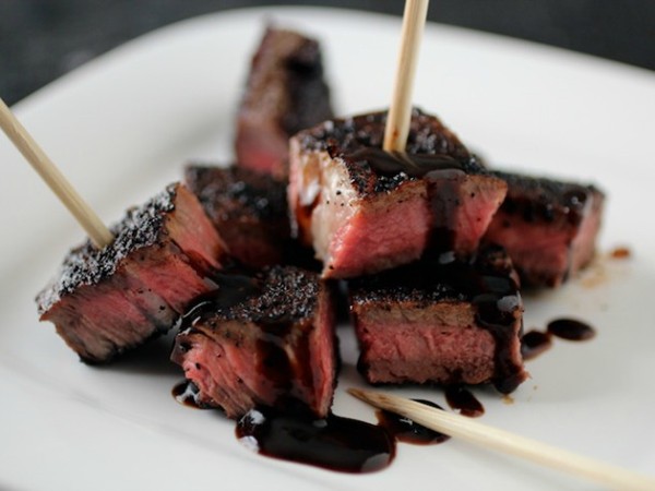 Coffee and chipotle-rubbed steak kabobs with stout molasses pan sauce