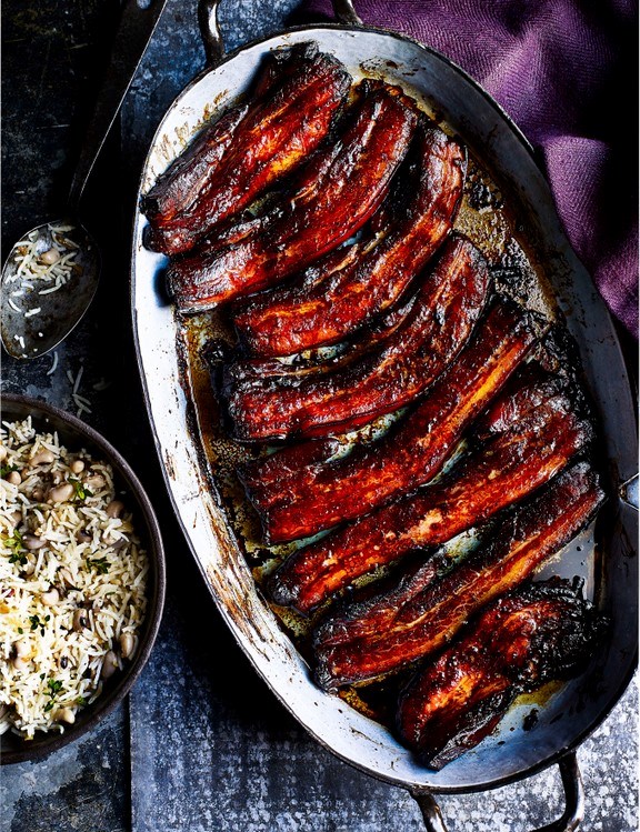 Coffee-and-treacle-brined pork belly with rice and beans