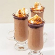Coffee cappuccino creams with cream and sweet coffee sauce