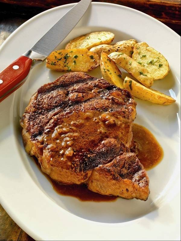 Coffee-rubbed rib eye steaks with stout glaze