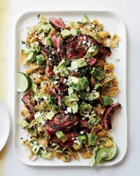 Cola-marinated flank steak with frito chilaquiles