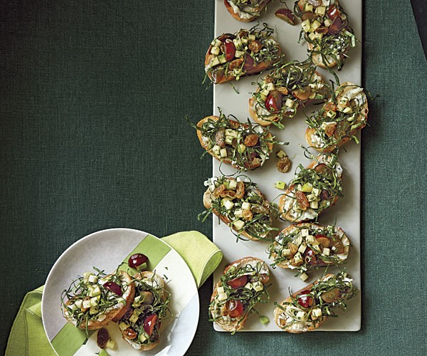 Collard green crostini with blue cheese and grape-apple relish
