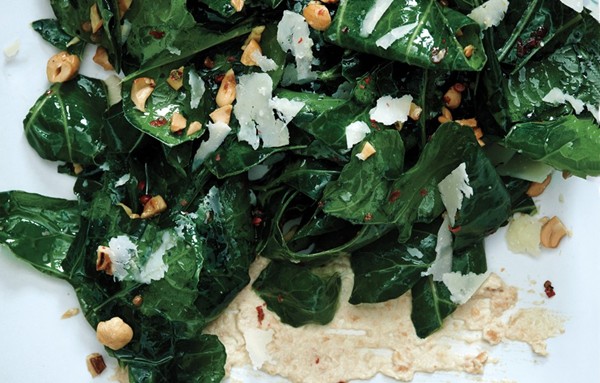 Collard green salad with cashews and lime