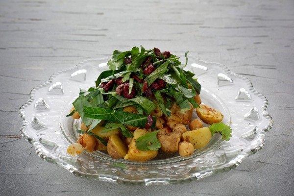 Collard greens, potato and chickpea salad with spiced lemon dressing