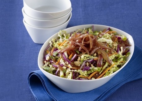 Colorful Asian slaw with warm ginger-lime dressing