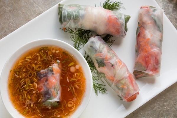 Colorful summer rolls with dipping sauce