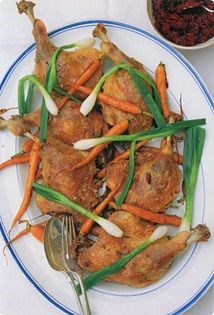 Confit duck legs with carrots, spring onions & beetroot relish