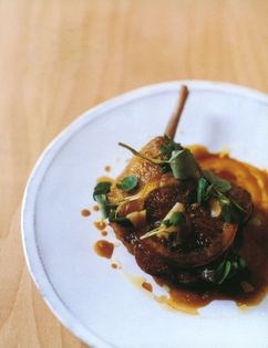 Confit duck legs with orange, ginger and watercress