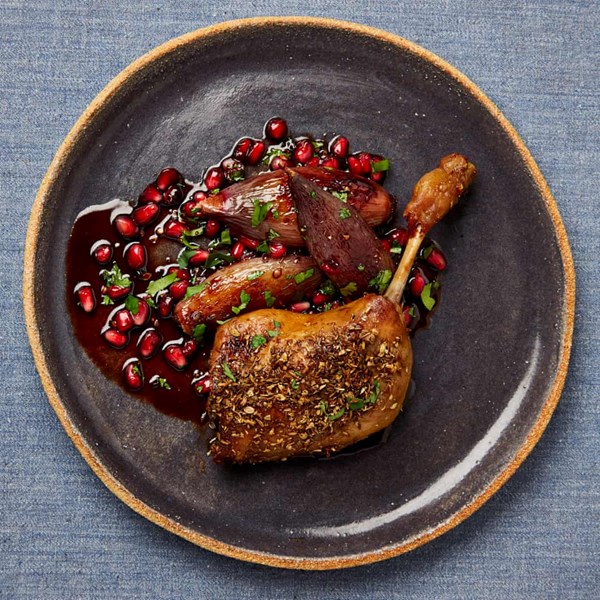 Confit duck legs with shallots and pomegranate