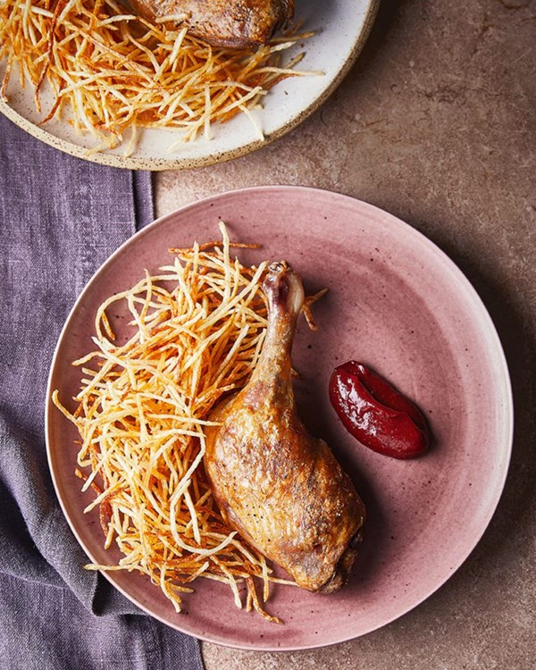 Confit duck legs with shoestring fries and plum ketchup 