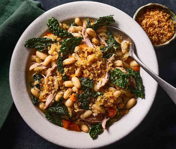 Confit duck with beans & cavolo nero