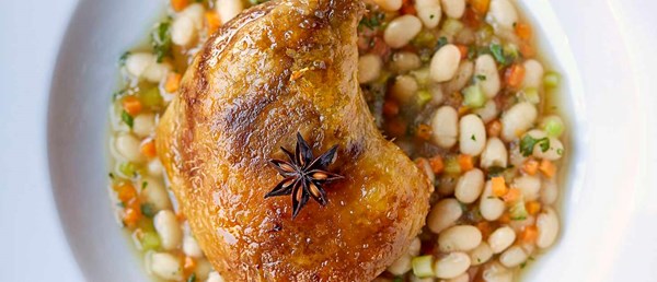 Confit Gressingham duck leg, haricot beans and star anise duck sauce