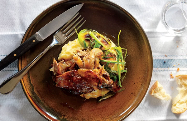 Confit lamb shoulder with polenta and Brussels sprouts