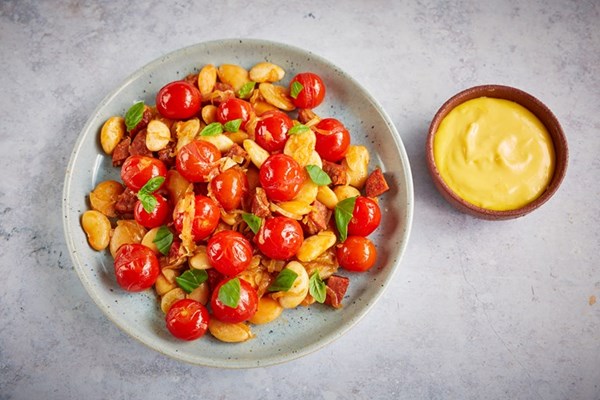 Confit Piccolo cherry tomatoes with butter beans, chorizo and saffron aioli