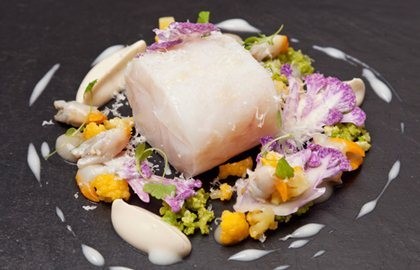 Confit pollock with cauliflower, cockles and Parmesan