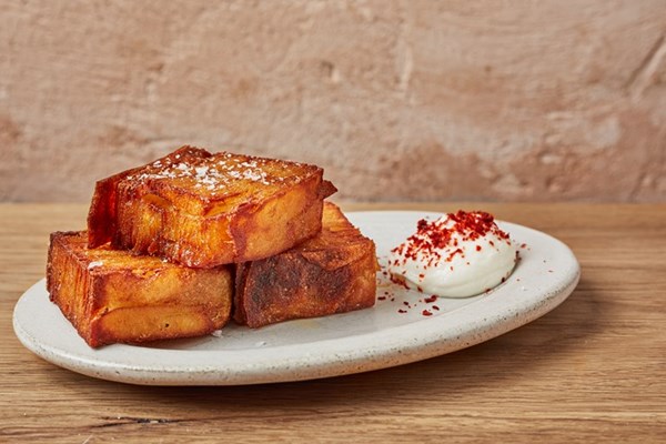 Confit potato latkes with toum