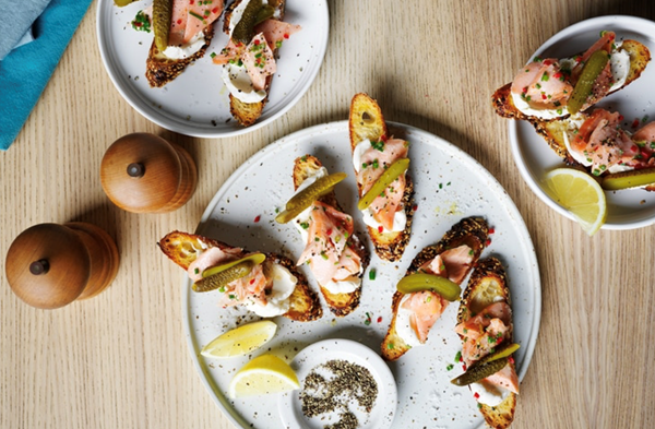 Confit salmon on toast, creme fraiche, cornichon