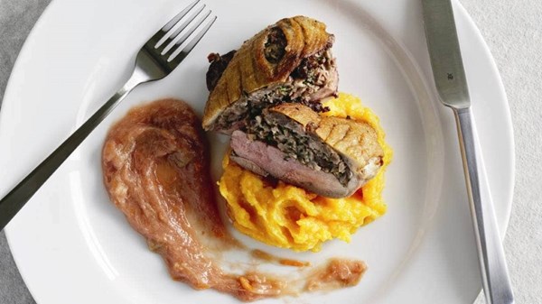 Confit stuffed duck breast with sweet and sour rhubarb sauce