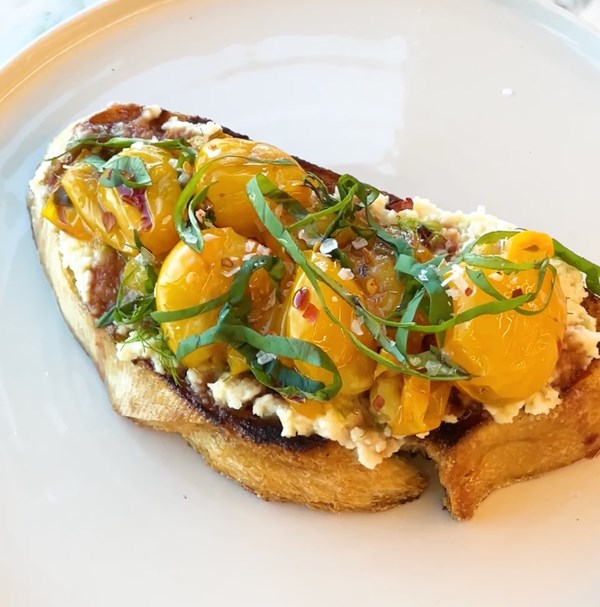 Confit Sungold tomatoes with almond ricotta