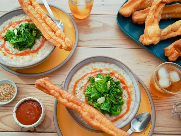 Congee with Chinese crullers and sautéed greens 