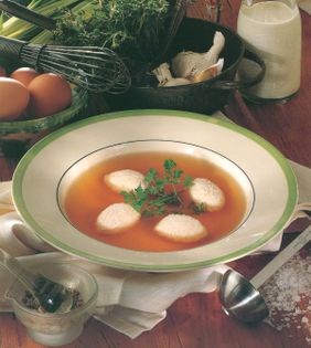 Consommé with chicken quenelles