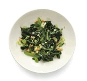 Cooked collard salad with peanut vinaigrette