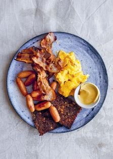 Copenhagen breakfast (smoked bacon and sausages with scrambled eggs)