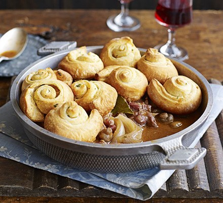 Coq au vin with garlic croissant puffs 