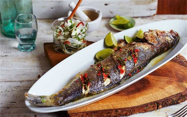 Coriander stuffed sea bass with fresh coconut salsa