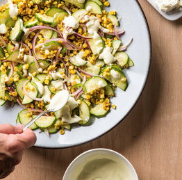 Corn and cucumber salad with red bell pepper and cilantro