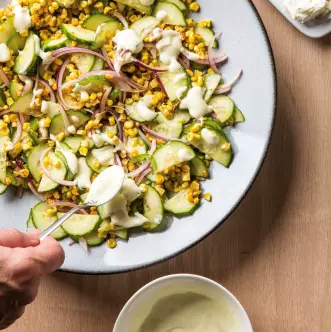 Corn and cucumber salad with red bell pepper and cilantro