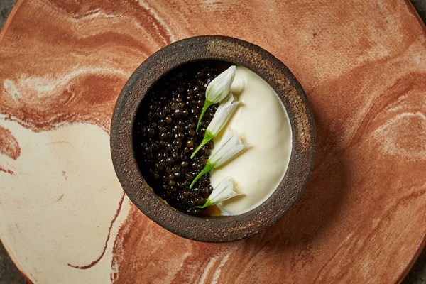 Corn and yellow pepper custard with crème fraîche and caviar (Nicuatole)