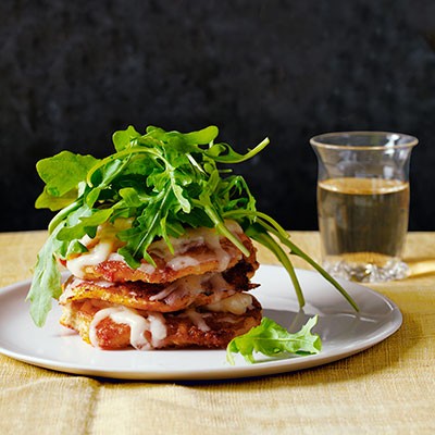 Corn cake stacks with aged cheddar and arugula