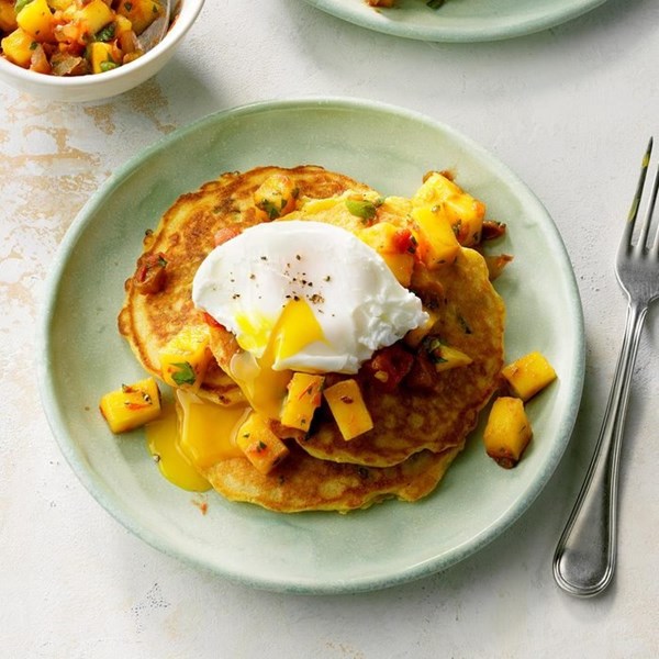 Corn cakes with poached eggs & mango salsa