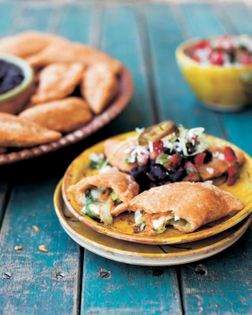 Corn empanadas with cheese and zucchini flowers (Panuchos con queso y flor de calabasa)