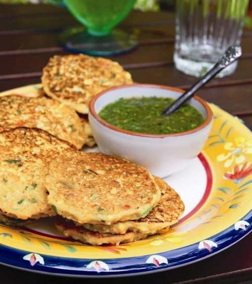 Corn fritters with cilantro sauce