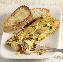 Corn, green pepper, ham, and cheese omelet