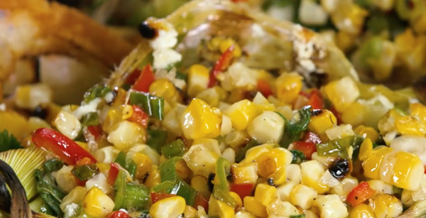 Corn husk-grilled goat cheese with corn relish and honey