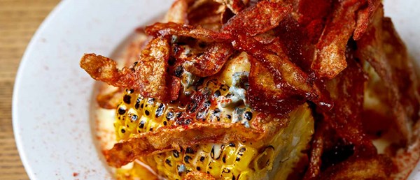 Corn on the cob, Stilton fonduta and crispy potato skins