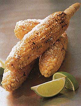 Corn on the cob with cheese and lime