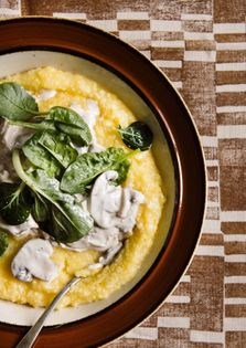 Corn porridge w/mushroom cream sauce + spinach