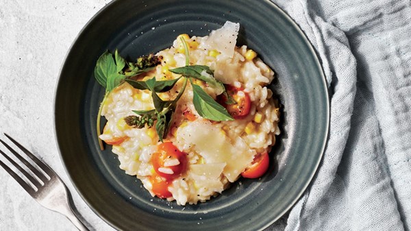 Corn risotto with basil and tomatoes