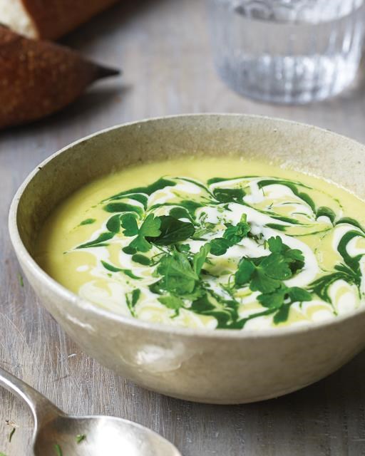 Corn soup with Comté cream and herb oil