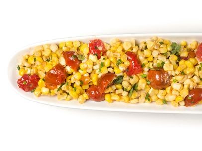 Corn with tomatoes and herbs