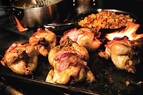 Cornbread-stuffed Cornish game hens with corn maque choux