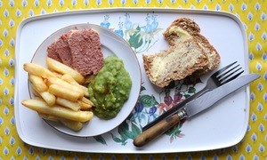 Corned beef and chips with mushy peas