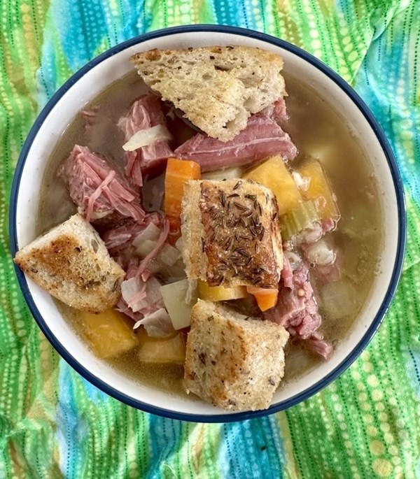 Corned beef vegetable soup with rye skillet croutons
