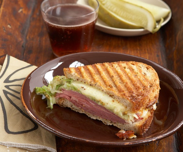 Corned beef with Muenster cheese and wilted cabbage